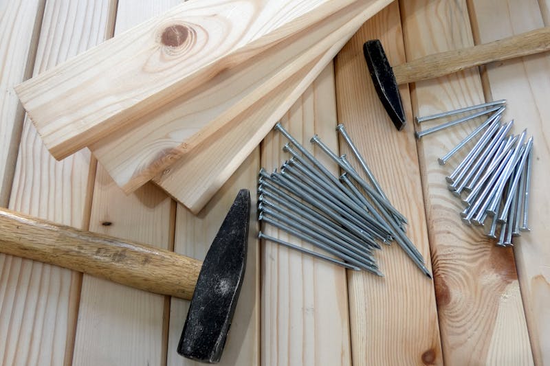 Circular saw cutting through wood, showing the blade and sawdust